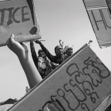 Members of the Boeung Kak Lake community in Cambodia demonstrate at a police blockade in December 2012.