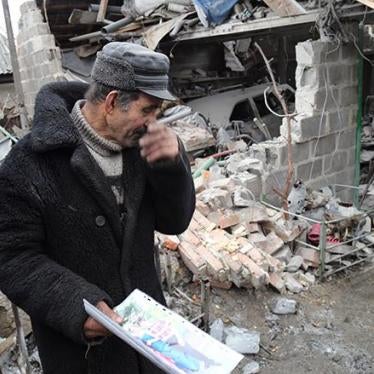 2015-2-ukraine-man-holding-photo-ru