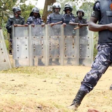Riot police block a driveway leading to the home of leading opposition politician and Forum for Democratic Change (FDC) party presidential candidate Kizza Besigye on the outskirts of Uganda's capital Kampala, February 20, 2016.