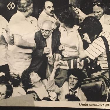 Michael Ratner (far right) and Reed Brody (fist raised) at 1984 protest of US support for Nicaraguan “contras”