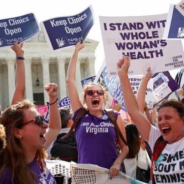 Demonstrators celebrate at the U.S. Supreme Court after the court struck down a Texas law imposing strict regulations on abortion doctors and facilities that its critics contended were specifically designed to shut down clinics in Washington June 27, 2016