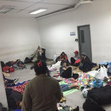 Detained Cubans in a cell at Quito's court offices building, waiting to be deported or released after deportation hearings, July 9, 2016.