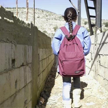 Bara’a, 10, originally from Ghouta, Syria, leaves for school from her informal refugee camp in Mount Lebanon.