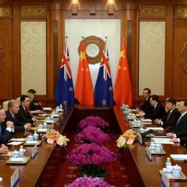Chinese President Xi Jinping (second from right) speaks with New Zealand's Prime Minister John Key (second from left) during their meeting at the Diaoyutai State Guesthouse in Beijing, China, April 19, 2016.