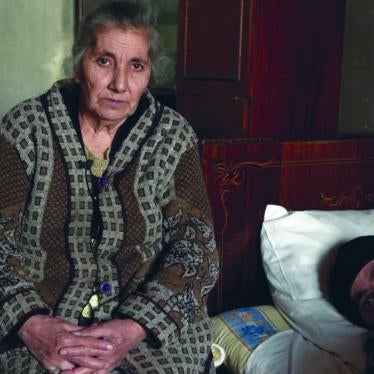 Gurgen G., who had a brain tumor, and his mother. Gurgen participated in a palliative care pilot project, which improved the quality of his remaining life. He died in August 2012, free from pain. 