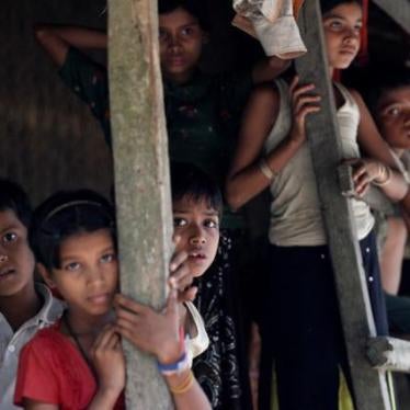 Rohingya Muslim children stand in U Shey Kya village outside Maungdaw in Rakhine state.
