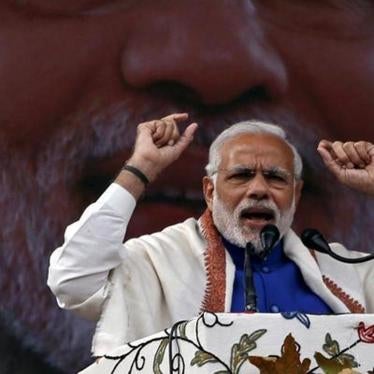 India's Prime Minister Narendra Modi addresses a rally in a cricket stadium in Srinagar, November 7, 2015.
