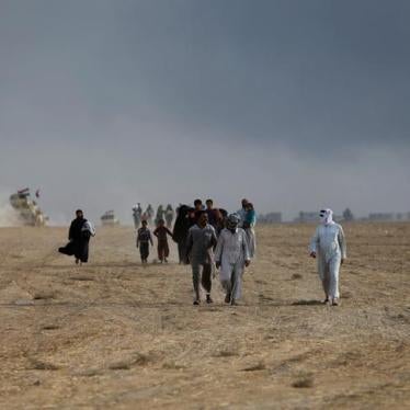 Civilians return to their village after it was retaken by anti-ISIS forces, south of Mosul, Iraq, October 21, 2016. 