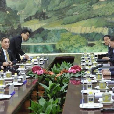 Chinese President Xi Jinping (R) attends a meeting with United Nations Secretary-General Ban Ki-moon (2nd L) at the Great Hall of the People in Beijing, China, September 3, 2015.
