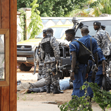 Burundian police hold suspects after discovering an alleged ammunition cache near Bujumbura, December 9, 2015.  