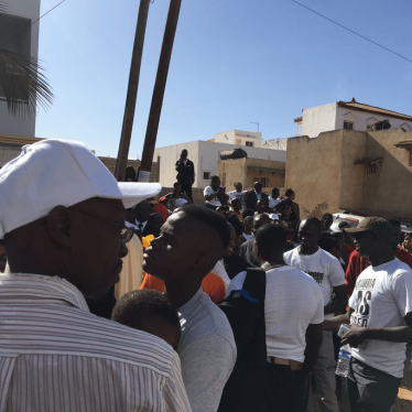 Gambians await the inauguration of President-elect Adama Barrow outside the Gambian Embassy in Dakar, Senegal.