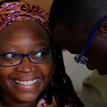Ugandan prominent academic Stella Nyanzi (L) speaks with her lawyer during court appearance for criticising the wife of President Yoweri Museveni on social media, at Buganda Road Court, Kampala, Uganda April 10, 2017.