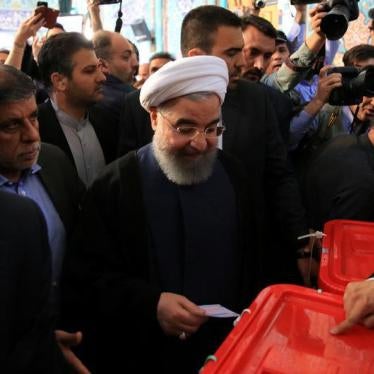 Iranian President Hassan Rouhani casts his vote during the presidential election in Tehran, Iran, May 19, 2017. 