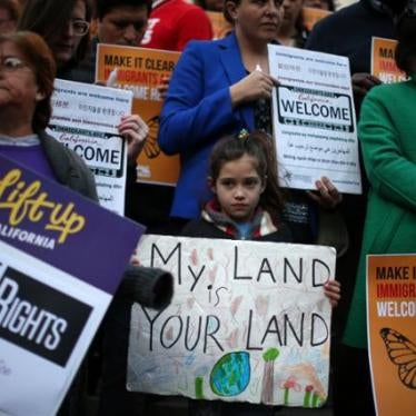 Maya Casillas, 7, attends a vigil in response to President Donald Trump's executive orders relating to immigration, in Los Angeles, California, January 25, 2017.
