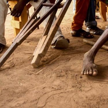 People with disabilities living in displacement camps in Kaga-Bandoro hold a meeting in April 2017. The group convenes each Sunday, and members say they receive very little assistance. 