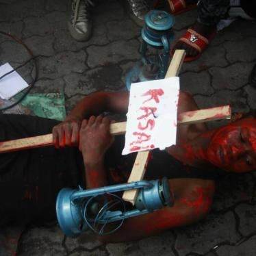 An artist protests the killings across the Democratic Republic of Congo’s central Kasai region, in the eastern city of Goma, June 23, 2017. Four artists were arrested, and released after five days. 