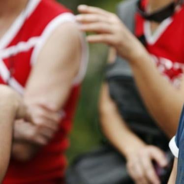 Activists hold a National Wear V-neck Day gathering in response to seminars led by the Malaysian government on “spotting gay symptoms,” in Kuala Lumpur, September 30, 2012.
