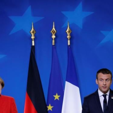 German Chancellor Angela Merkel and French President Emmanuel Macron addresses a joint news conference at the EU summit in Brussels, Belgium, June 23, 2017.
