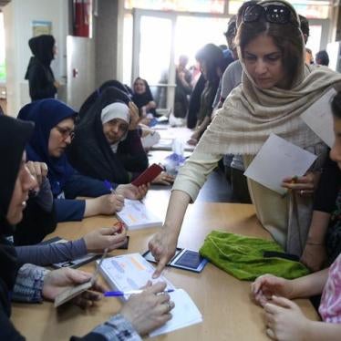 Voters cast their ballots during the presidential election in a Jewish and Christian district in the center of Tehran, Iran, May 19, 2017. 