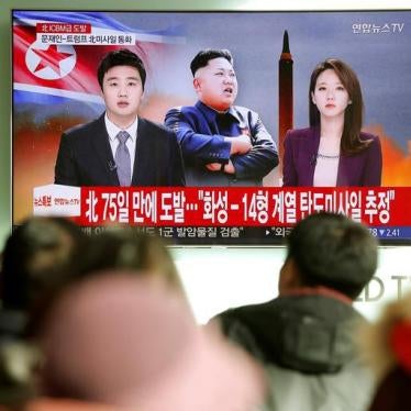 People watch a TV broadcasting a news report on North Korea firing what appeared to be an intercontinental ballistic missile (ICBM) that landed close to Japan, in Seoul, South Korea, November 29, 2017.