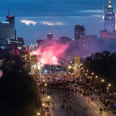 Protesters march during a rally, organised by far-right, nationalist groups in Warsaw, Novermber, 11, 2017.