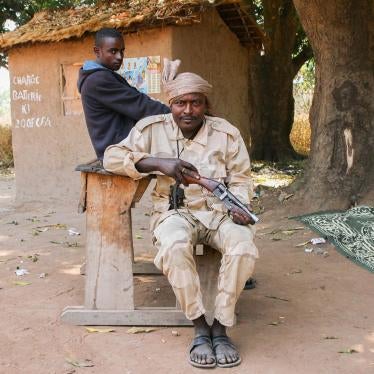 Seleka MPC fighters at a roadblock in Bojomo, Ouham province, with a desk they removed from the local school. 