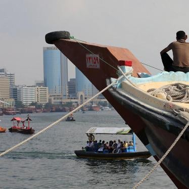 Iranian workers rest on a commercial ship at Dubai Creek, January 17, 2016. 