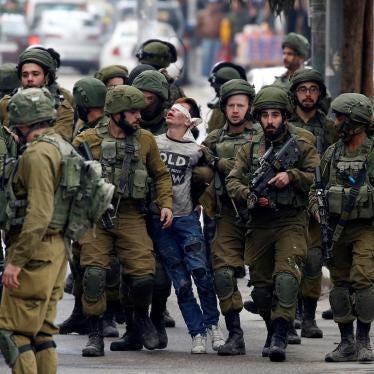 Israeli soldiers detain 16-year-old Fawzi al-Junaidi in Hebron amid protests in December over the US decision to recognize Jerusalem as the capital of Israel.