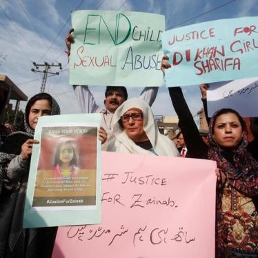 People chant slogans and hold signs to condemn the rape and killing of 7-year-old girl Zainab Ansari in Kasur, during a protest in Peshawar, Pakistan January 11, 2018.