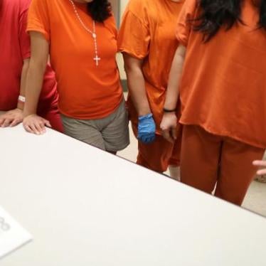 Women stand in a dormitory at the Adelanto immigration detention center, which is run by the Geo Group Inc (GEO.N), in Adelanto, California, U.S., April 13, 2017.