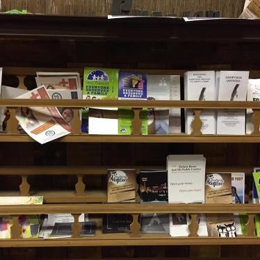 A display of brochures for adoption and foster care in Knoxville, Tennessee.