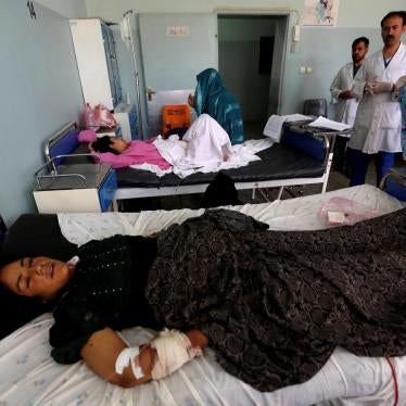 An Afghan woman receives medical treatment after being injured during an airstrike in Herat province, Afghanistan, August 29, 2017.