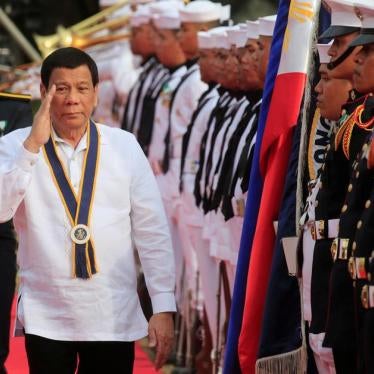 Philippine President Rodrigo Duterte salutes while passing the honour guards upon arrival during the 120th Philippine Navy anniversary in Metro Manila, Philippines May 22, 2018.