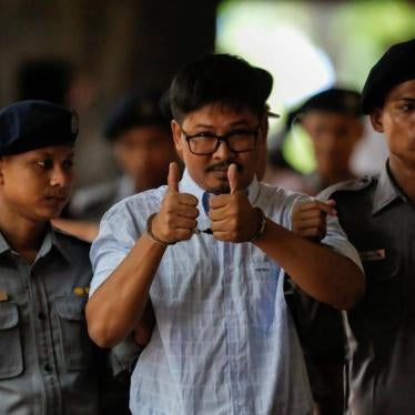 Wa Lone arrives for a court hearing in Yangon, Myanmar, June 18, 2018.
