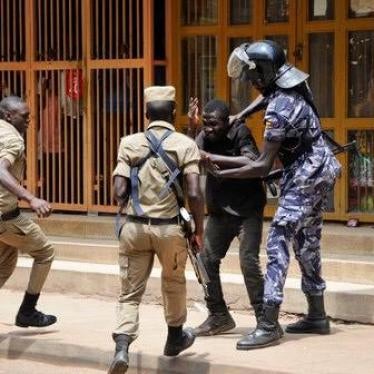 Ugandan security forces briefly beat then detain a protester in downtown Kampala, Uganda, Monday, Aug. 20, 2018. Ugandan police fired bullets and tear gas to disperse a crowd of protesters demanding the release of jailed lawmaker, pop star, and government