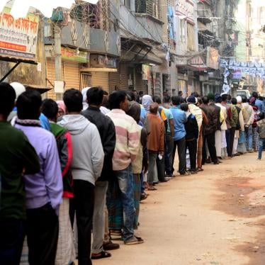 Bangladeshi male voters wait in line outside a polling station to cast their vote in Dhaka, Bangladesh, on December 30, 2018. 