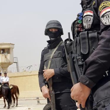 Egyptian policemen secure Egypt’s national police academy. © 2015 AP Photo/Amr Nabil