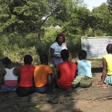 Mozambican girls take part in a lesson as part of a program that aims to help girls stay in school longer and stay out of child marriage