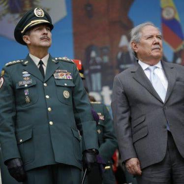 Colombia's army commander, General Nicacio Martínez Espinel, left, and Colombia's Defense Minister Guillermo Botero, attend a military ceremony where Martínez was promoted to 4 star General, in Bogotá, Colombia, Friday, June 7, 2019.
