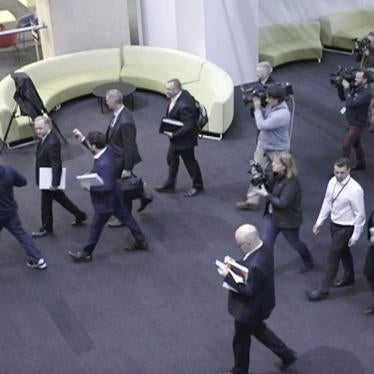 Australia's Federal Police enter the Australian Broadcasting Corporation, the national public broadcaster, during a raid on their offices in Sydney, Australia. (Australian Broadcasting Corporation via AP, File).