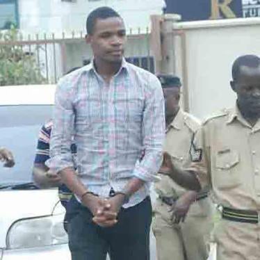 Prison guards escort Bob Chacha Wangwe to the Kisutu Magistrates Court in Dar es Salaam, May 11, 2016.