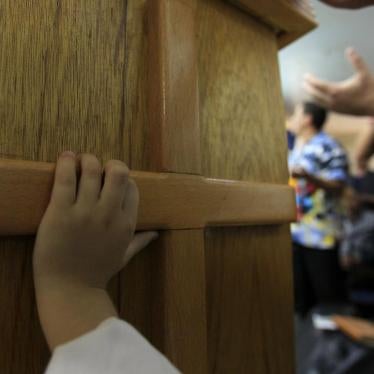 A Protestant Berber boy attends a weekly mass at a church in Tizi-Ouzou, 100 kilometers east of Algeria's capital, Algiers, October 2, 2010.