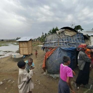 Rohingya walk at Dar Paing camp, Rakhine State, Myanmar, March 17, 2017.