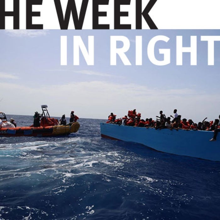 Two ships face each other in the ocean.