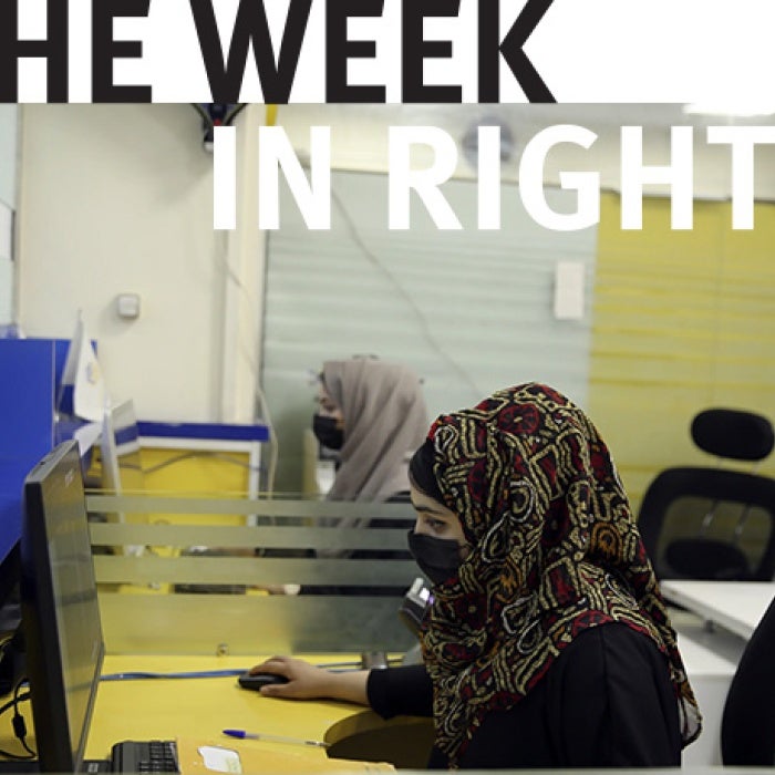 Female students use computers. 