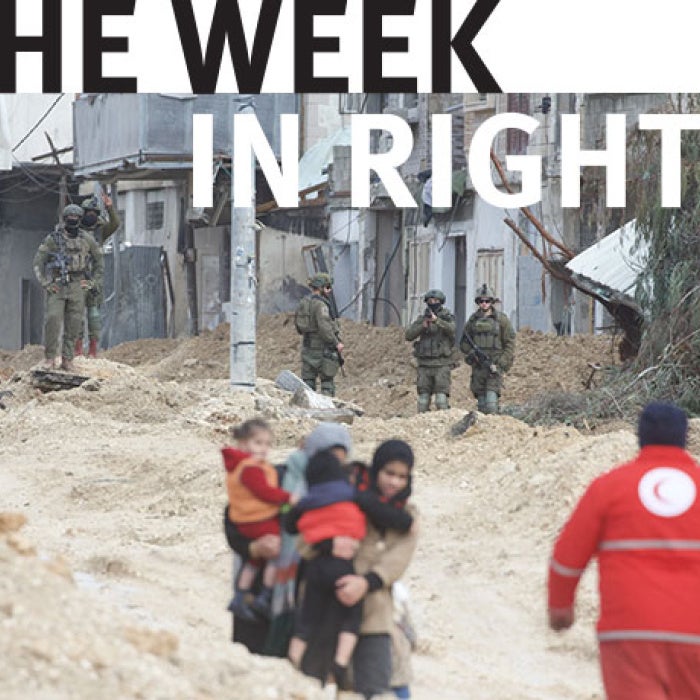 Aid workers walk through the West Bank. 