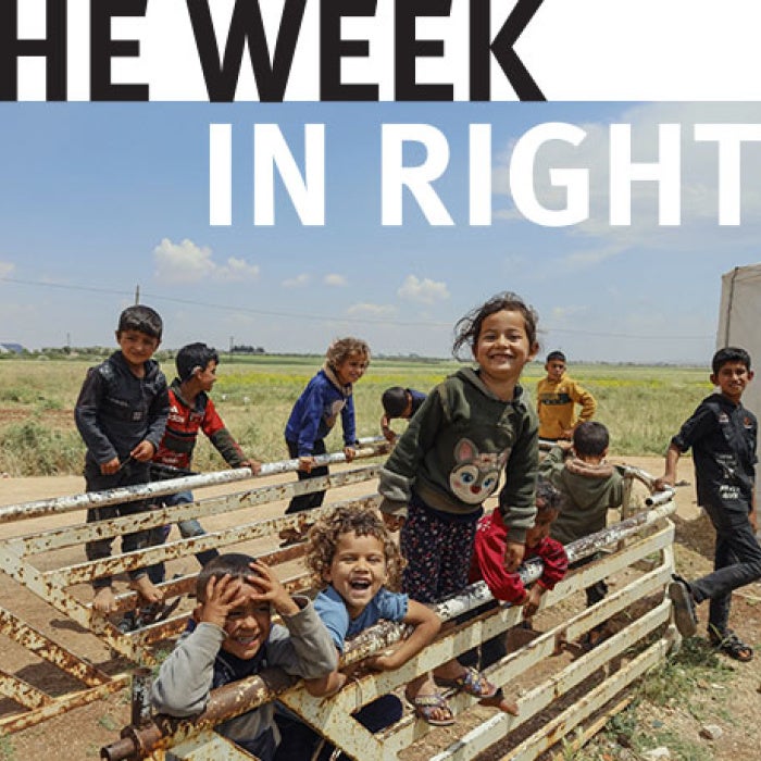 Children face camera. 