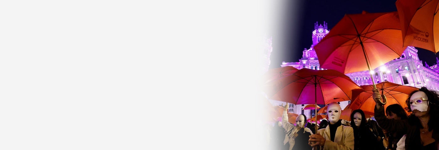 Sex workers wear masks while asking for the clubs where they work not to close, during an event on International Women's Day in Madrid, Spain, March 8, 2023.